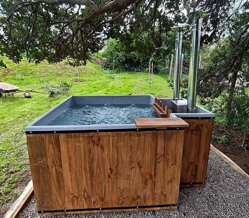 Tinaja y jardín en cabañas